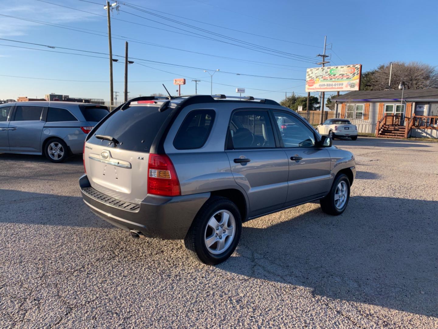 2008 Kia Sportage LX I4 2WD (KNDJF724X87) with an 2.0L L4 DOHC 16V engine, AUTOMATIC transmission, located at 1830 North Belt Line Road, Irving, TX, 75061, (469) 524-0199, 32.834373, -96.993584 - Photo#5